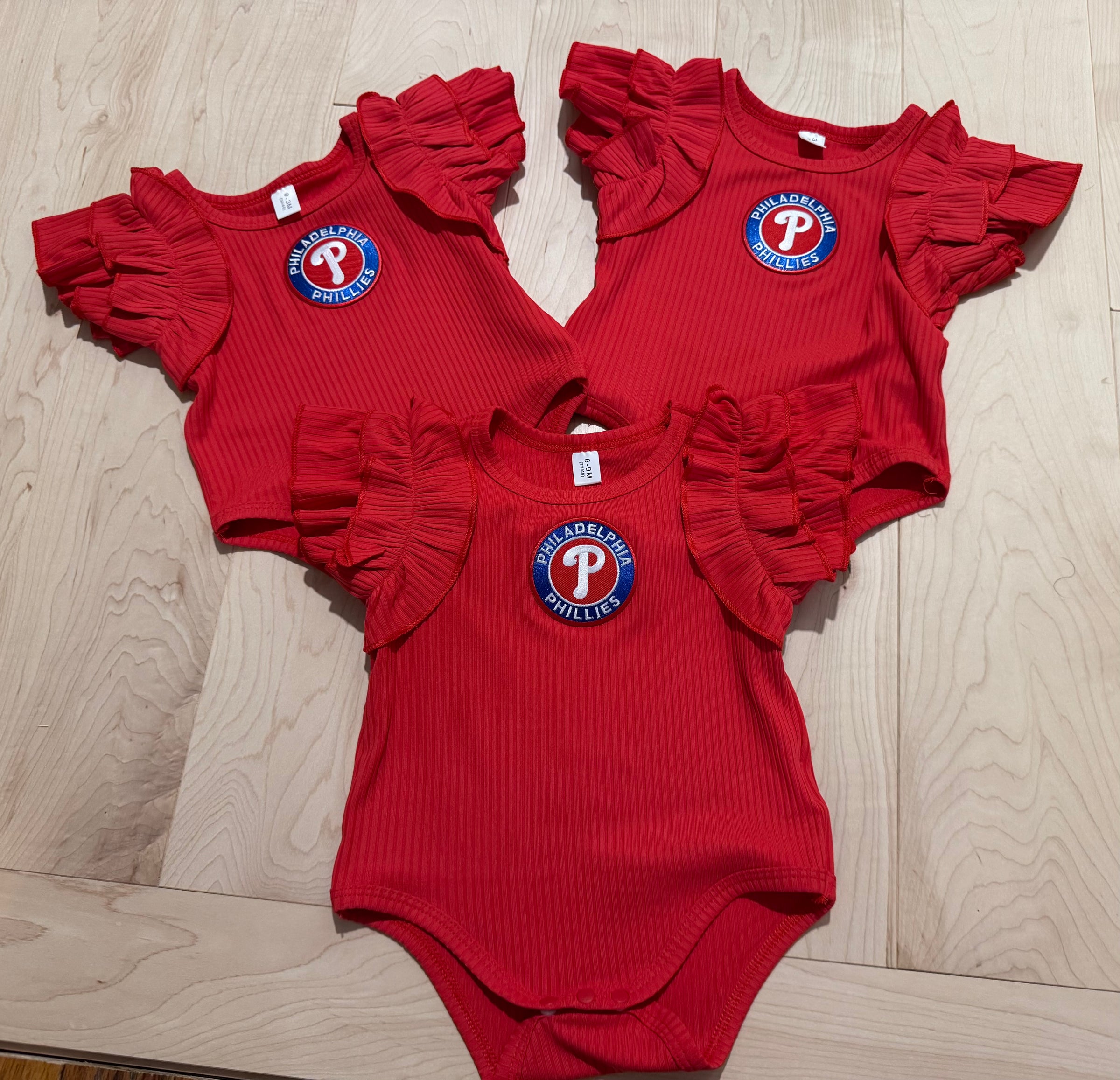 Frilly Philly Circle Patch Baby Onesie